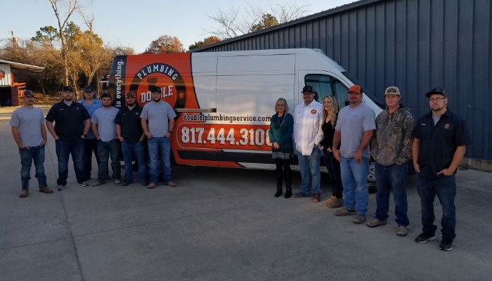 Double L Plumbing Staff By Truck